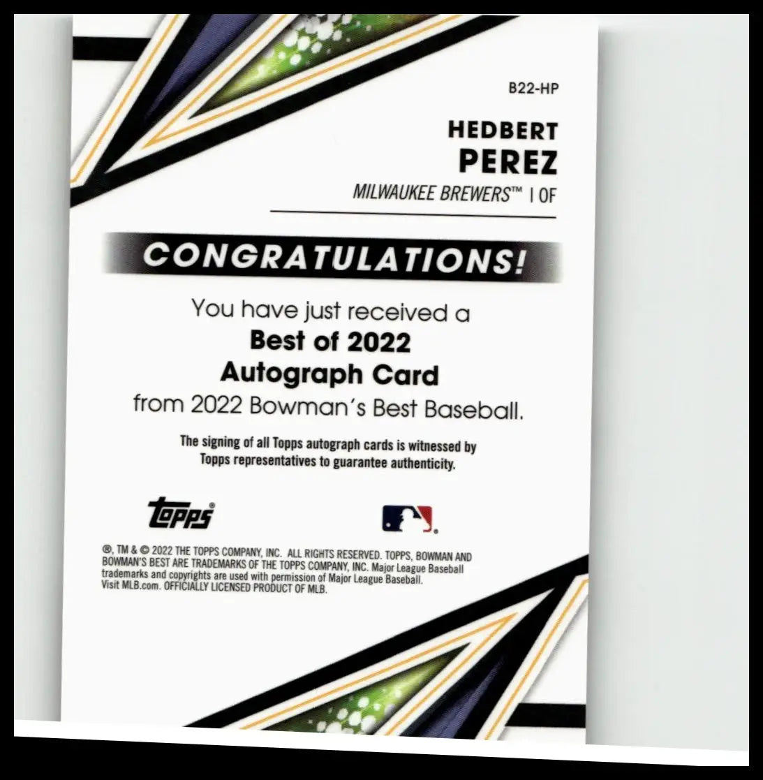 White and black baseball card with gold accents featuring congratulatory message for hedbert perez best 2022 autograph
