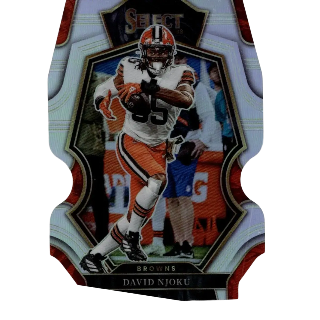 A glossy shield-shaped 2022 panini select silver prizm die cut football trading card featuring david njoku in orange and white uniform number 35