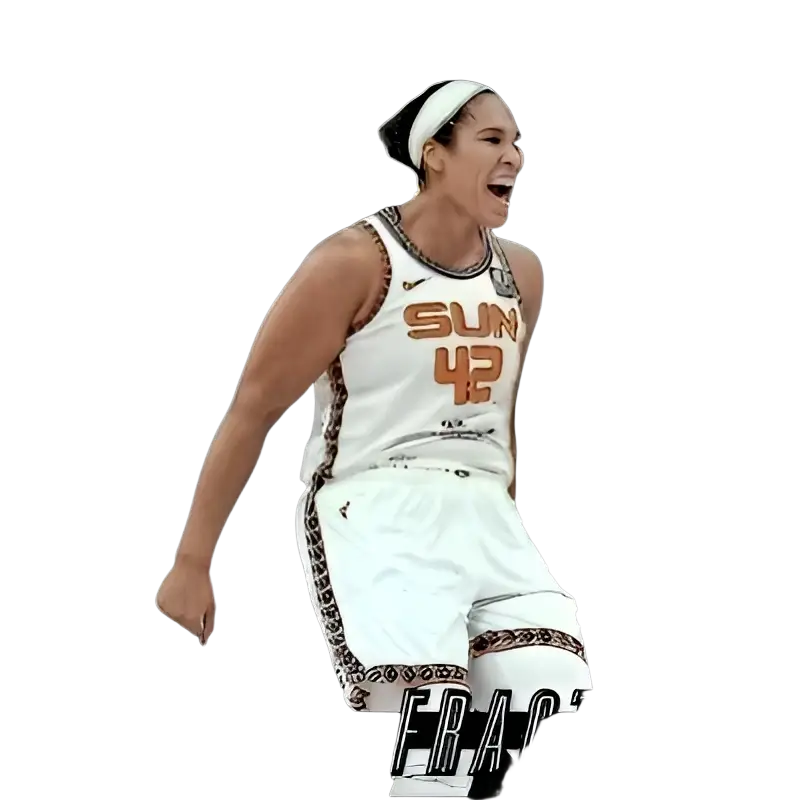 White basketball jersey with orange ’sun’ and number ’42,’ featuring black trim and a silver chain detail around the neckline, worn by brionna jones.