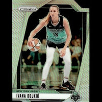 This is a green and black new york liberty basketball trading card featuring ivana dojkić in action, with the prizm brand logo at the top.