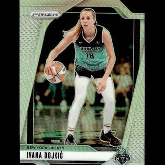 This is a green and black new york liberty basketball trading card featuring ivana dojkić in action, with the prizm brand logo at the top.