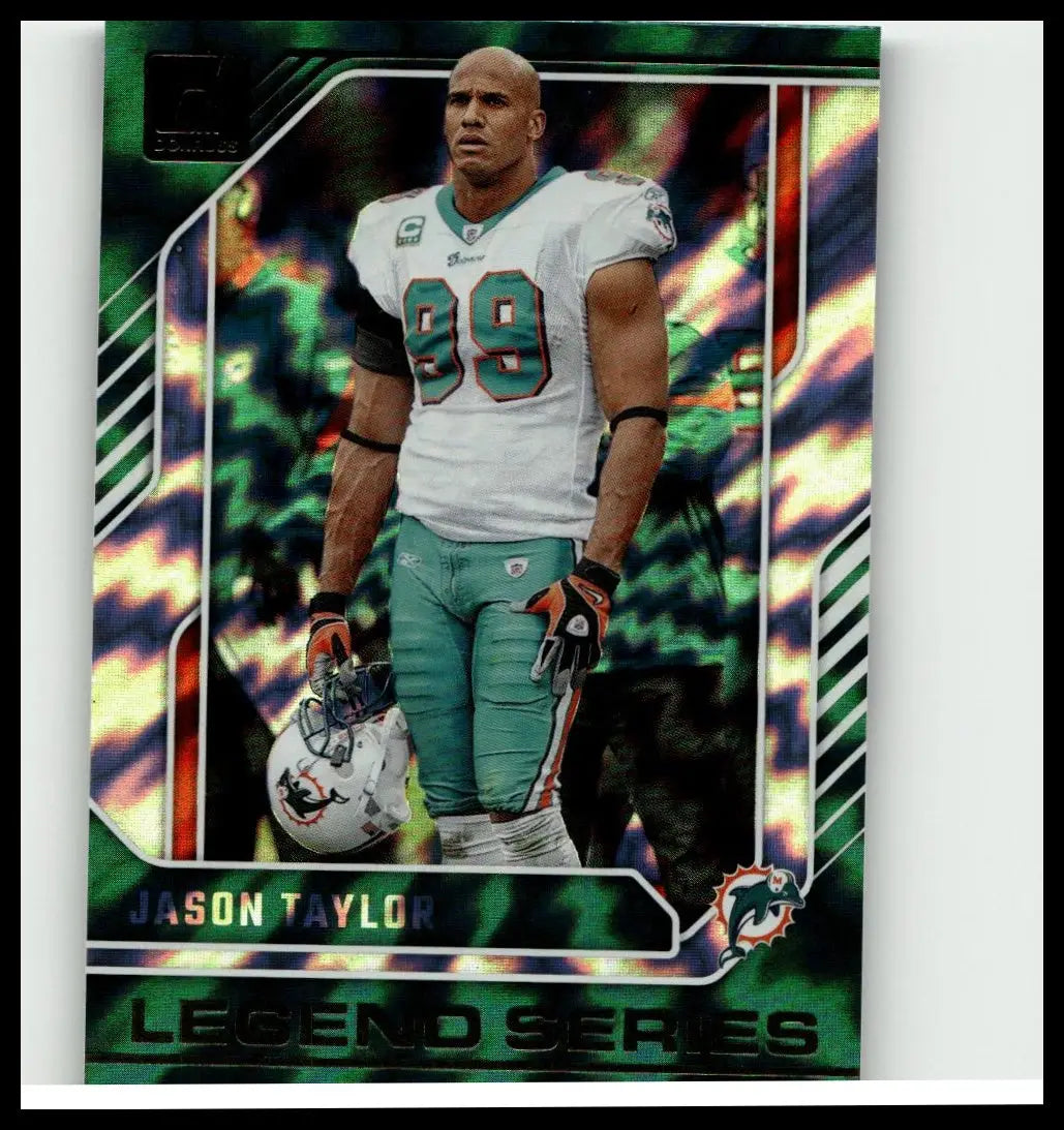 A vibrant green and black holographic 2024 donruss jason taylor legend series football trading card in dolphins uniform