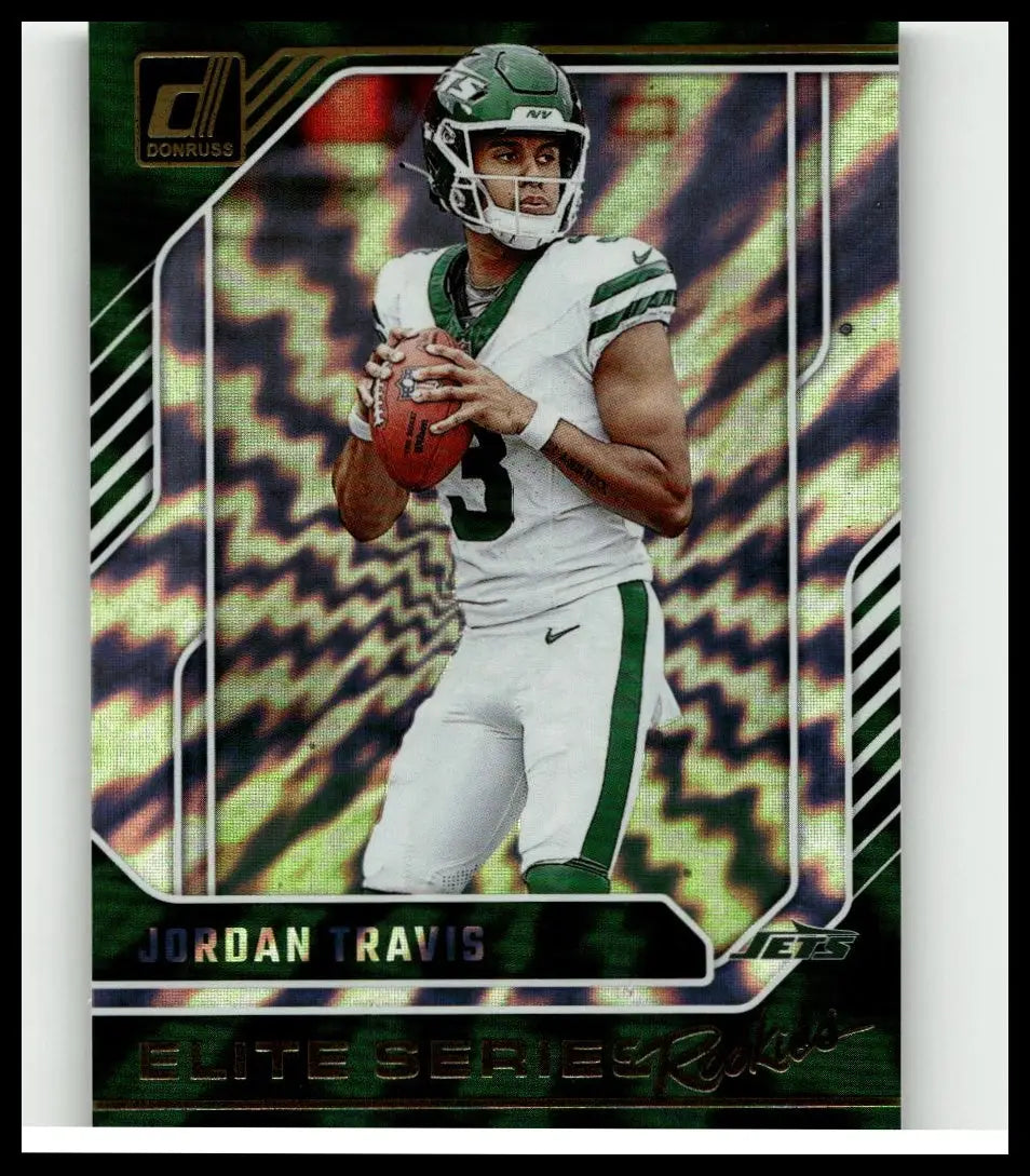 Green and white 2024 donruss jordan travis elite series rookies football card with holographic background and action pose