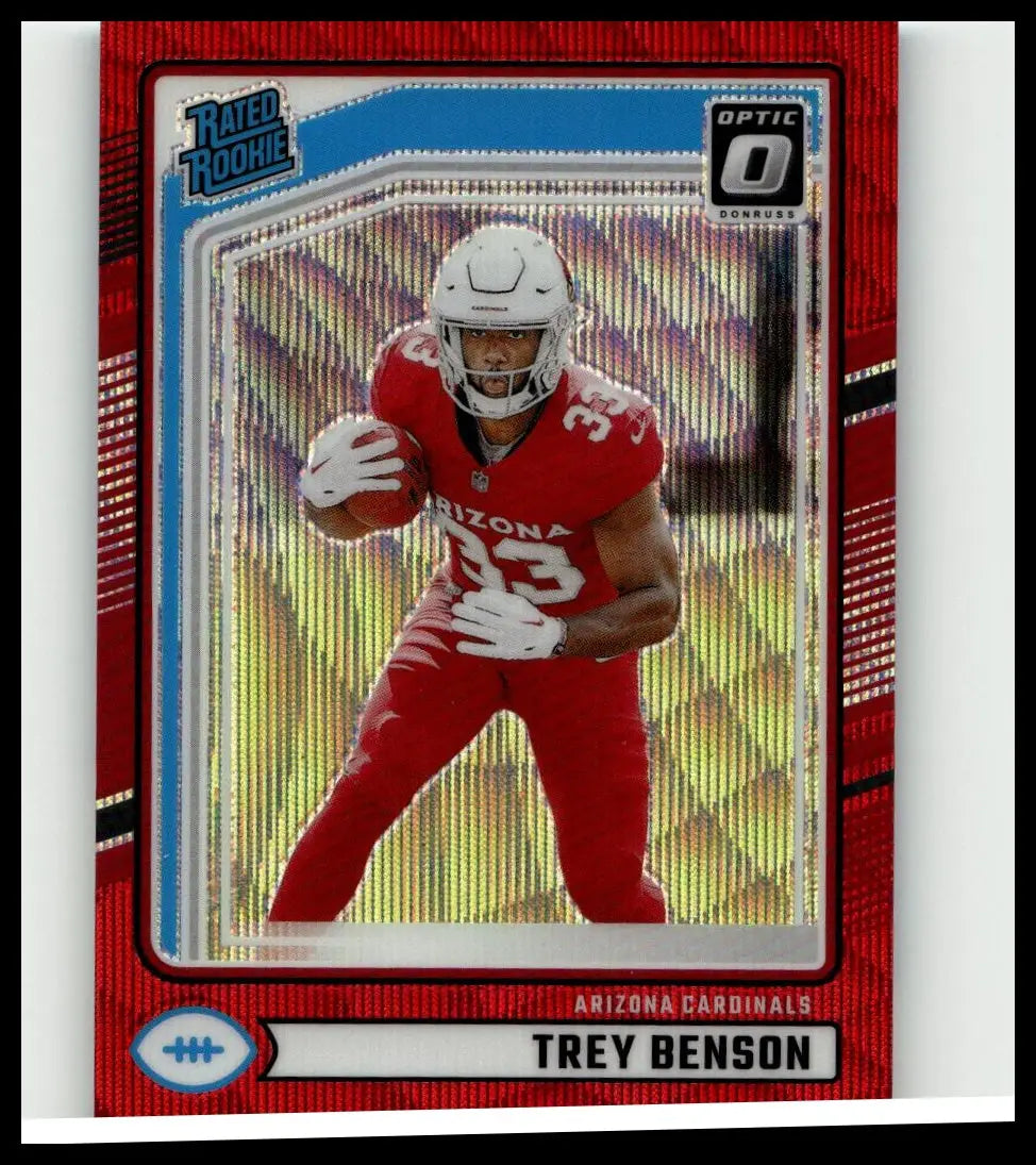 Red and silver holographic 2024 donruss #326 trey benson optic rated rookie football trading card in arizona cardinals uniform