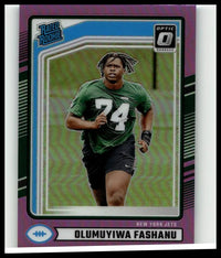 Purple and green holographic border 2024 donruss olumuyiwa fashanu optic rated pink sports trading card