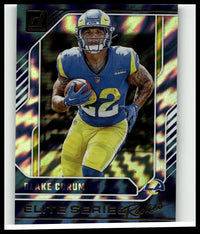 Blue and yellow los angeles rams blake corum in blue jersey number 22 holding ball 2024 donruss corum elite series card