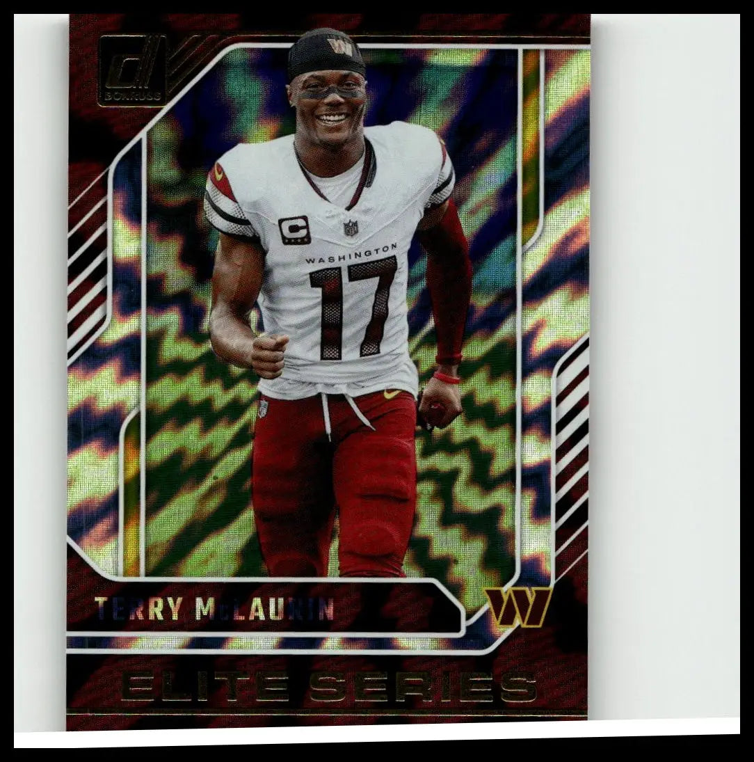 A glossy iridescent 2024 donruss terry mclaurin elite series trading card featuring mclaurin in white washington jersey