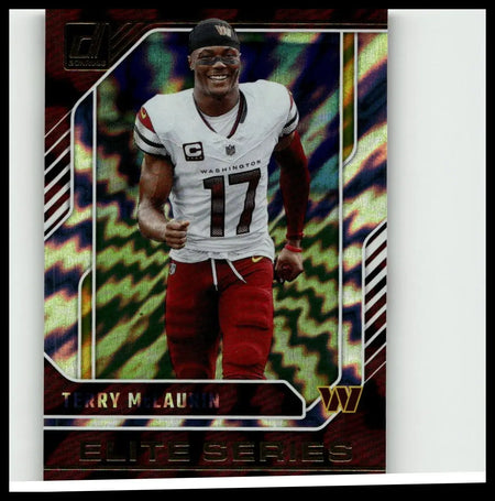 A glossy iridescent 2024 donruss terry mclaurin elite series trading card featuring mclaurin in white washington jersey