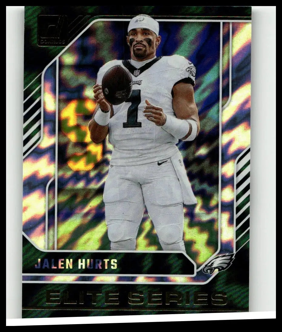 Jalen Hurts in white Philadelphia Eagles jersey number 1 holding football featured in 2024 Donruss Jalen Hurts Elite series card