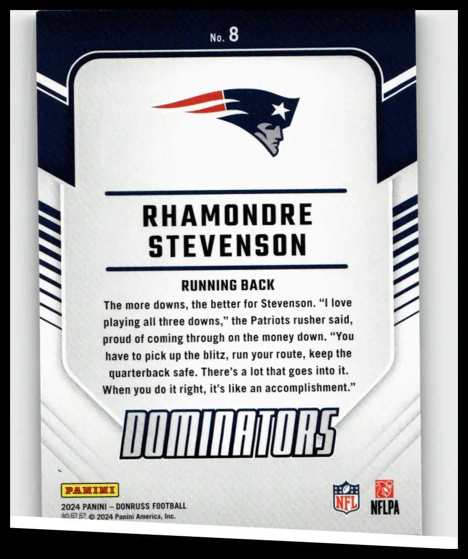 White and navy blue football trading card featuring rhamondre stevenson dominators with new england patriots logo