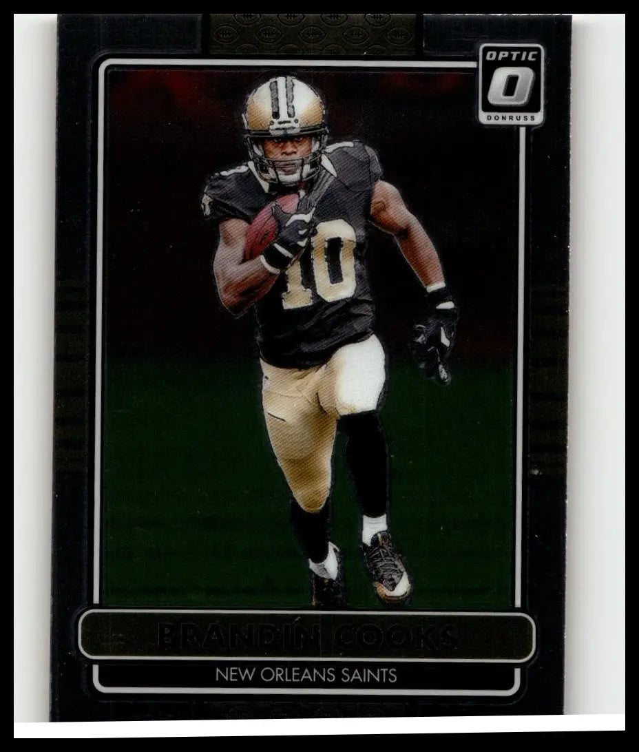 Black and gold donruss optic football trading card featuring brandin cooks in action from the 2014 retro series