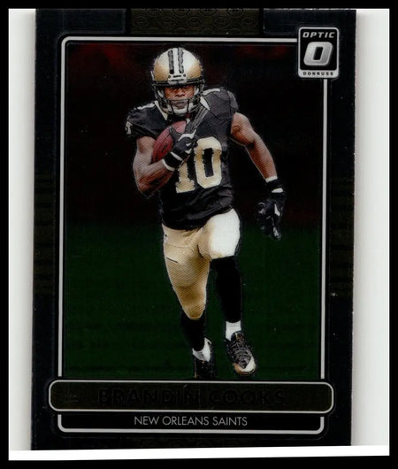 Black and gold donruss optic football trading card featuring brandin cooks in action from the 2014 retro series