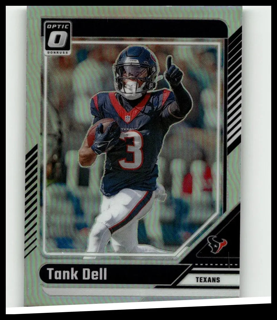Silver and black donruss optic 2024 trading card featuring tank dell holo in houston texans navy blue jersey number 3