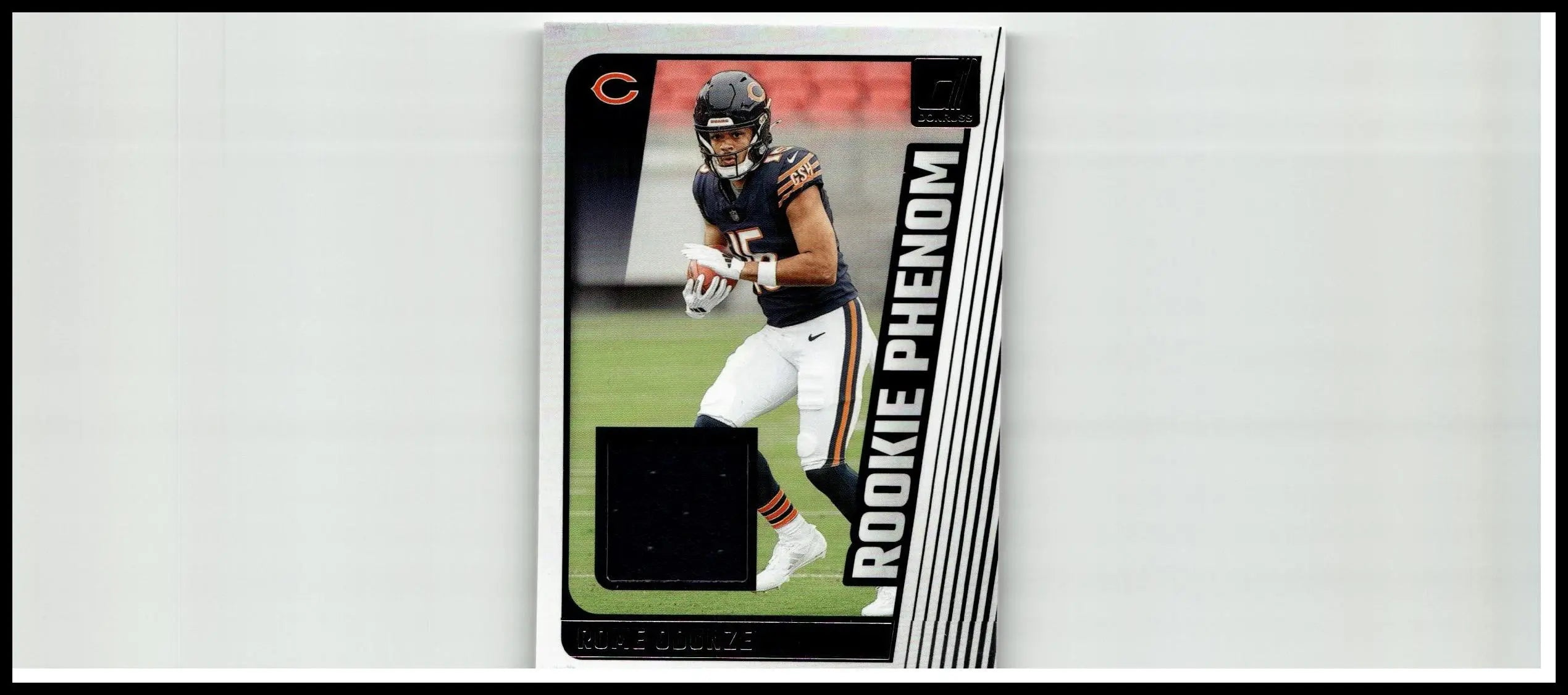 2024 Donruss rome odunze rookie phenom jersey trading card with black white design and silver accents