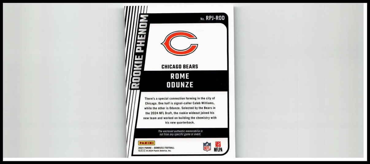 Chicago bears rome odunze rookie card 2024 Donruss black and white design with bold red lettering odunze rookie phenom