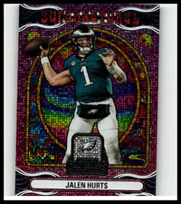 A vibrant purple and gold holographic 2024 Panini Contenders jalen hurts supernatural football trading card