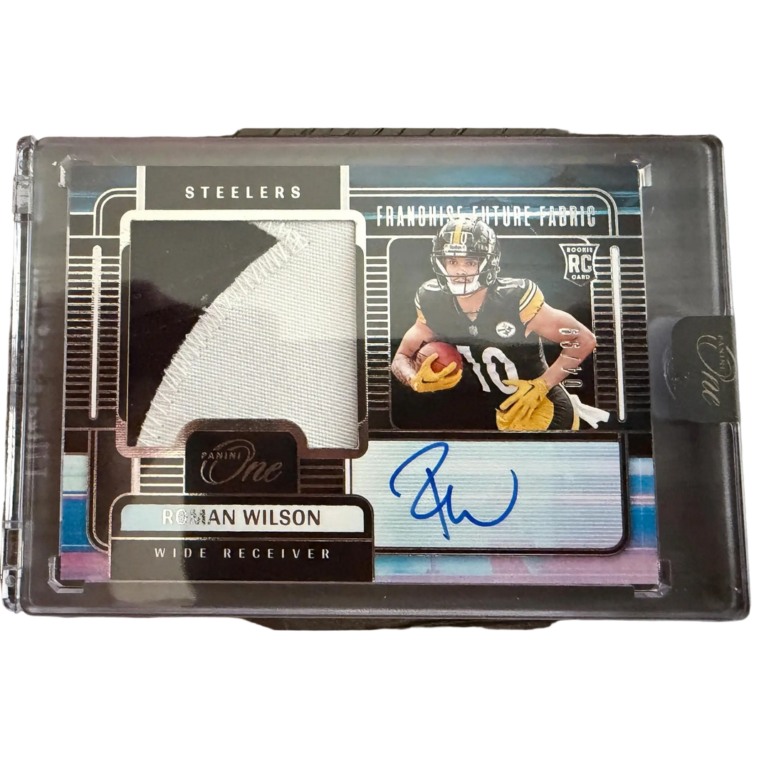 Roman Wilson rookie card 2024 Panini One featuring black and gold Steelers jersey swatch and blue autograph on silver panel