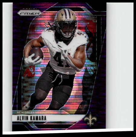 This 2024 panini prizm football card features alvin kamara in saints uniform with a purple pulsar holographic background