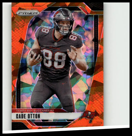 A Tampa Bay Buccaneers 2024 Panini Prizm orange ice football card featuring Cade Otton in black jersey holding ball