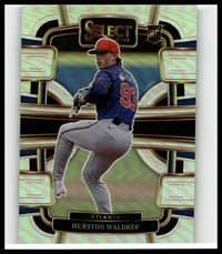 2024 panini select baseball trading card featuring hurston waldrep in atlanta braves uniform mid-pitch with red cap and blue jersey