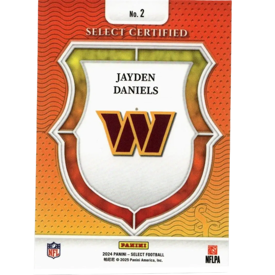 This is a 2024 panini select football trading card featuring jayden daniels with the washington commanders logo, designed in an orange and gold shield motif.