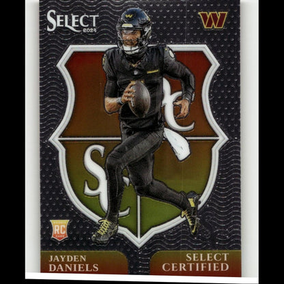 Black football trading card featuring jayden daniels in a black uniform with yellow accents, holding a brown football.