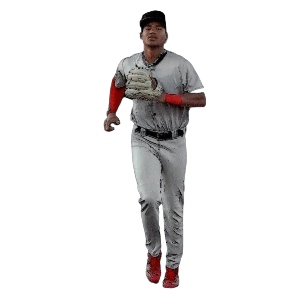 A baseball player in a gray uniform with red accents and matching red cleats, wearing a white glove.