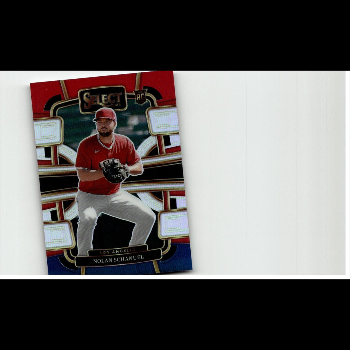 Red and black baseball trading card featuring nolan schanuel in a red jersey, white pants, and cap.