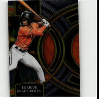 Orange and white baseball jersey with black helmet, worn by enrique bradfield jr.