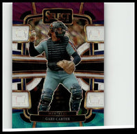 A glossy purple and gold-bordered 2024 Panini Select #65 baseball card featuring Gary Carter in Montreal Expos gear