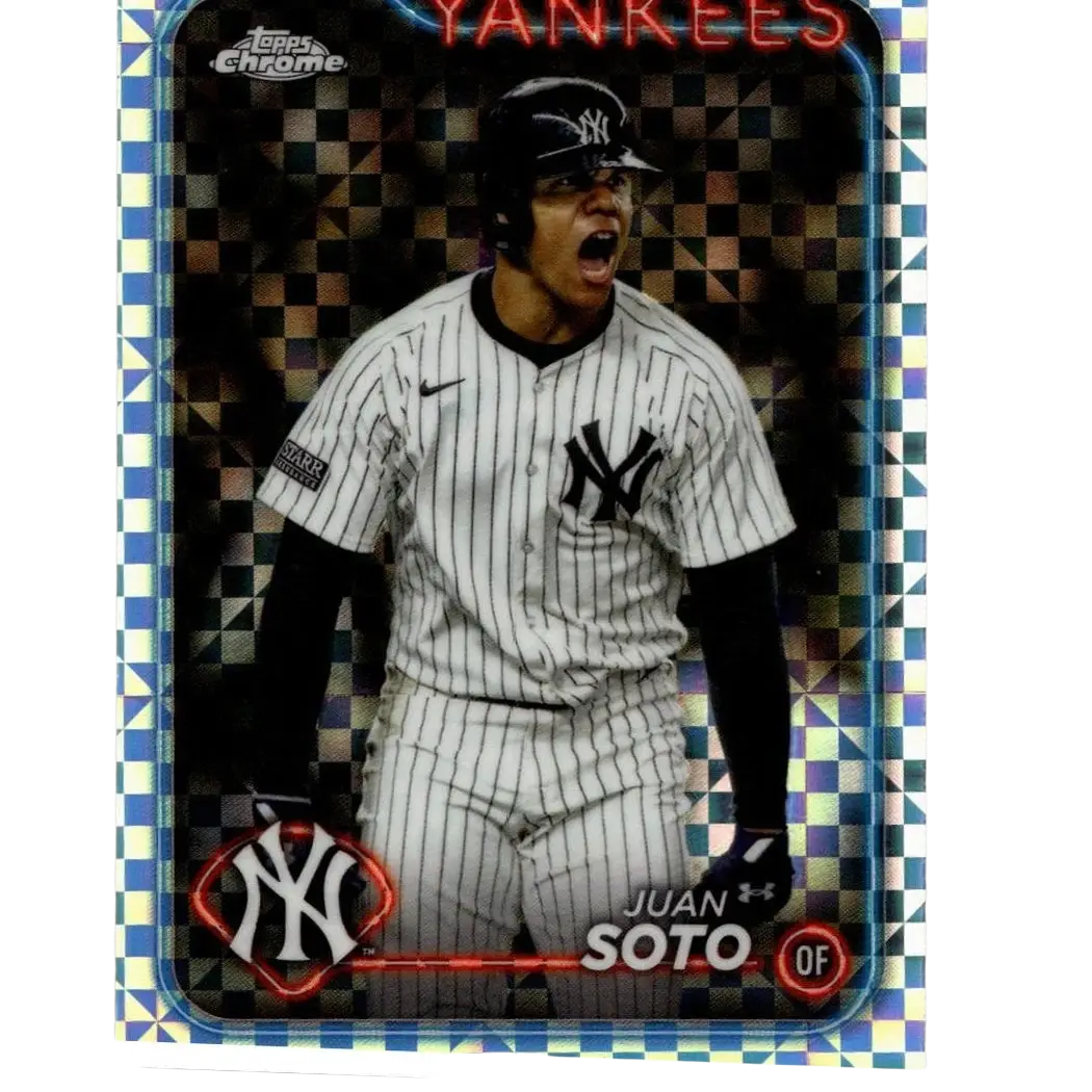 A shiny, chrome-bordered baseball trading card featuring juan soto in a white pinstripe yankees uniform with black accents and the under armour logo.