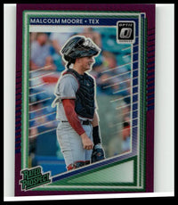 2025 donruss #124 malcolm moore optic purple baseball card featuring catcher in gray uniform with red sleeves and black gear