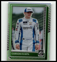 A 2025 donruss #59 carson kvapil optic trading card with a green and silver holographic border featuring kvapil in a white and blue suit