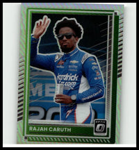 Green and silver bordered 2025 Donruss trading card featuring nascar driver Rajah Caruth in blue racing suit holding a can caruth optic holo