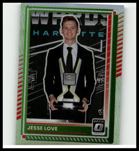A green and red bordered 2025 donruss #75 jesse love optic trading card showing jesse love in a black suit holding a rookie of the year award