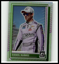 Purple and white racing suit with black accents and Tooties logo featured on the chest in Daniel Suarez Optic Holo design