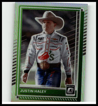 Justin Haley optic holo 2025 Donruss #86 features a white racing suit with red black accents and prominent lipstick logo