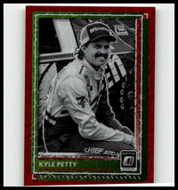 Red and green framed 2025 donruss kyle petty optic red velocity trading card featuring black and white photo