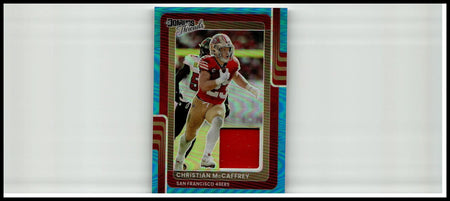 This is a red and gold christian mccaffrey donruss football trading card with holographic blue border from 2025 Donruss Optic