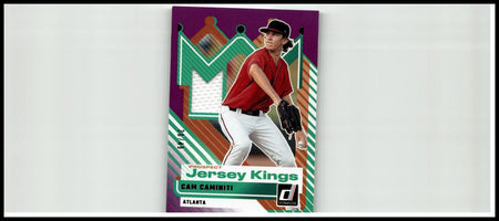 A vibrant purple and green 2025 donruss cam caminiti prospect jersey kings baseball card numbered 49 of 49