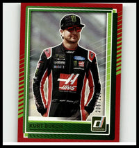 Red and green bordered 2025 Panini Donruss Kurt Busch NASCAR trading card featuring driver in black red and white suit, toys and games collectible