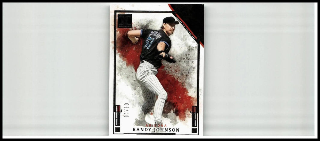 Black and white 2025 panini impeccable randy johnson silver baseball card featuring dynamic pitching pose with red splatter