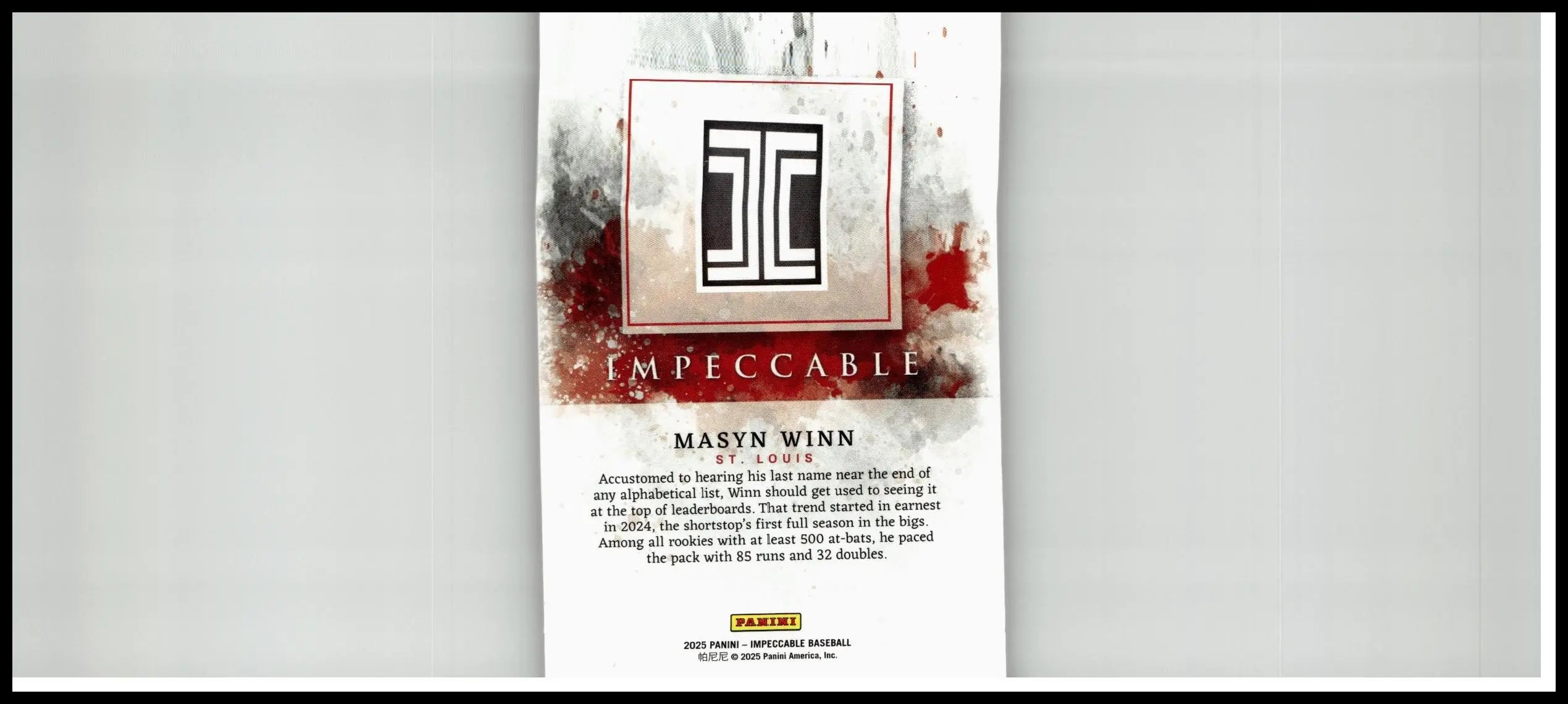 White baseball trading card featuring masyn winn holo silver with black tc logo and red splatter from 2025 panini impeccable