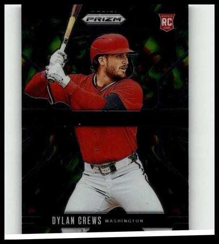 Red helmeted dylan crews baseball player mid-swing on 2025 panini prizm #14 dylan crews prizmatic rookie card