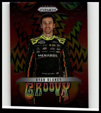 This 2025 panini prizm #18 ryan blaney groovy trading card features ryan blaney in a black and yellow racing suit on red background