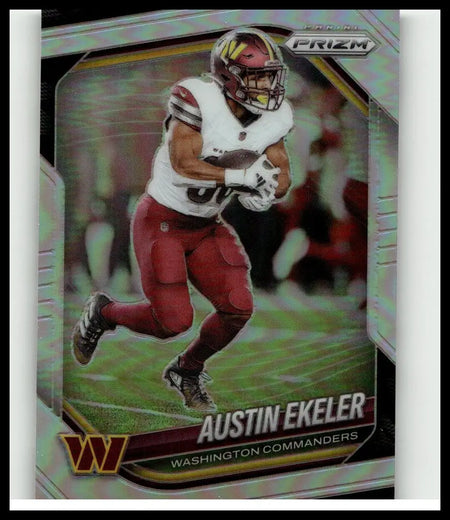 A shiny iridescent 2025 panini prizm silver trading card featuring austin ekeler in washington commanders uniform