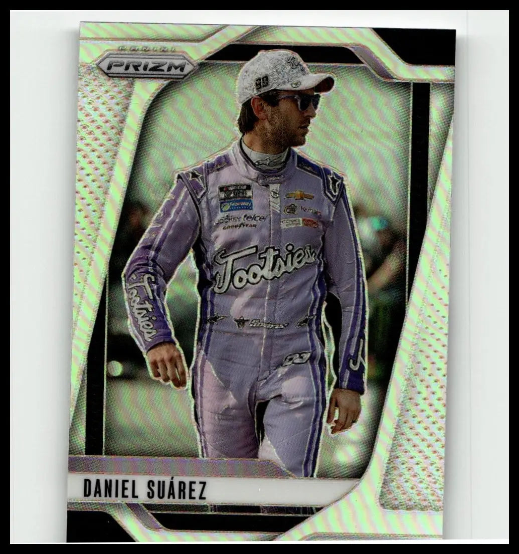 2025 panini prizm #36 daniel suarez silver trading card featuring daniel suarez in purple and silver footsteps racing suit