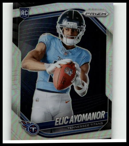 2025 panini prizm silver rookie card #440 featuring elic ayomanor in tennessee titans uniform holding orange football