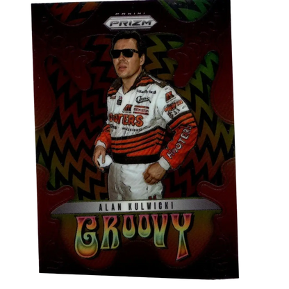 2025 panini prizm #5 alan kulwicki groovy trading card featuring him in white orange black racing suit on red background