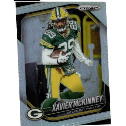 Green and yellow 2025 panini prizm #66 xavier mckinney silver football card featuring mckinney in green jersey holding ball